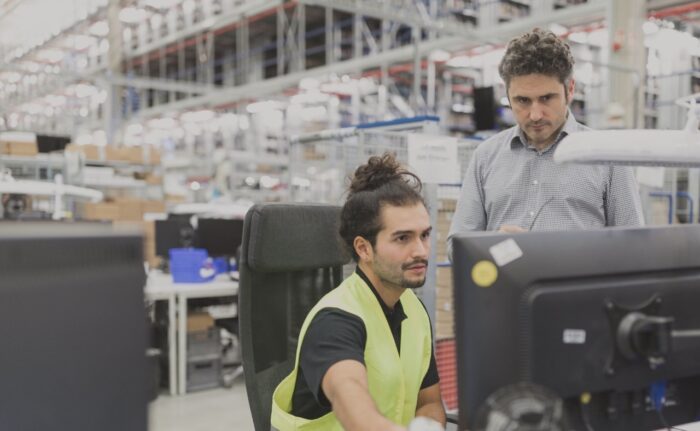 Operator exploring warehouse automation examples