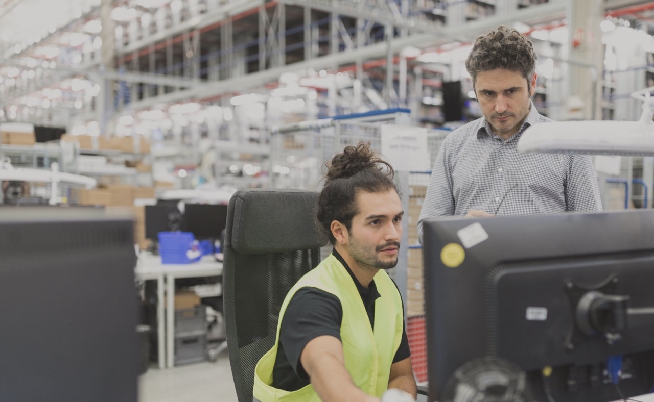 Operator exploring warehouse automation examples
