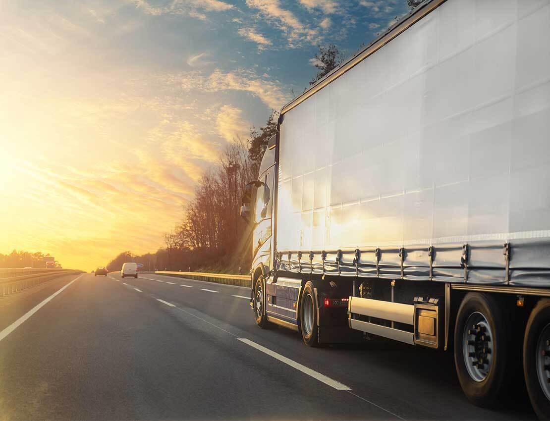 semitruck on highway in early morning