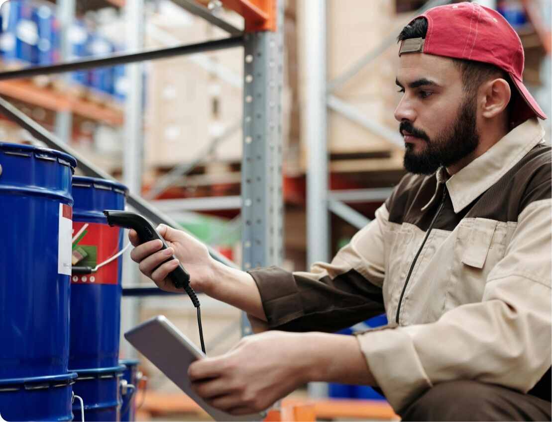 man with a red baseball hat working