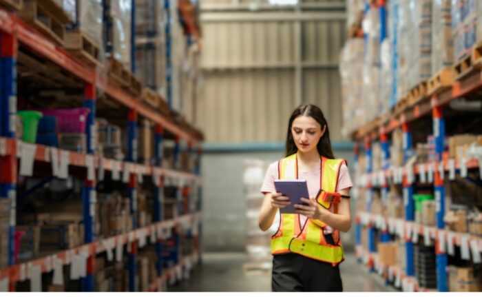 Warehouse supervisor exploring fulfillment center software