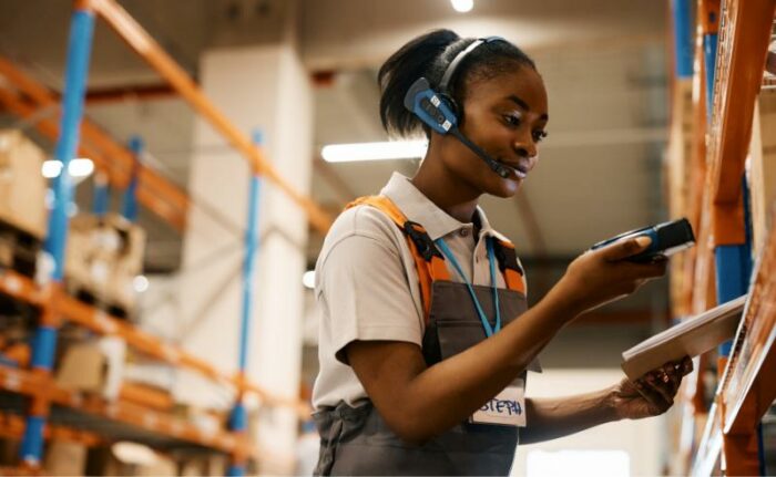 Warehouse supervisor exploring warehouse optimization software